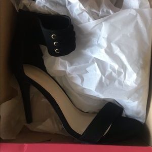Strapped black heels